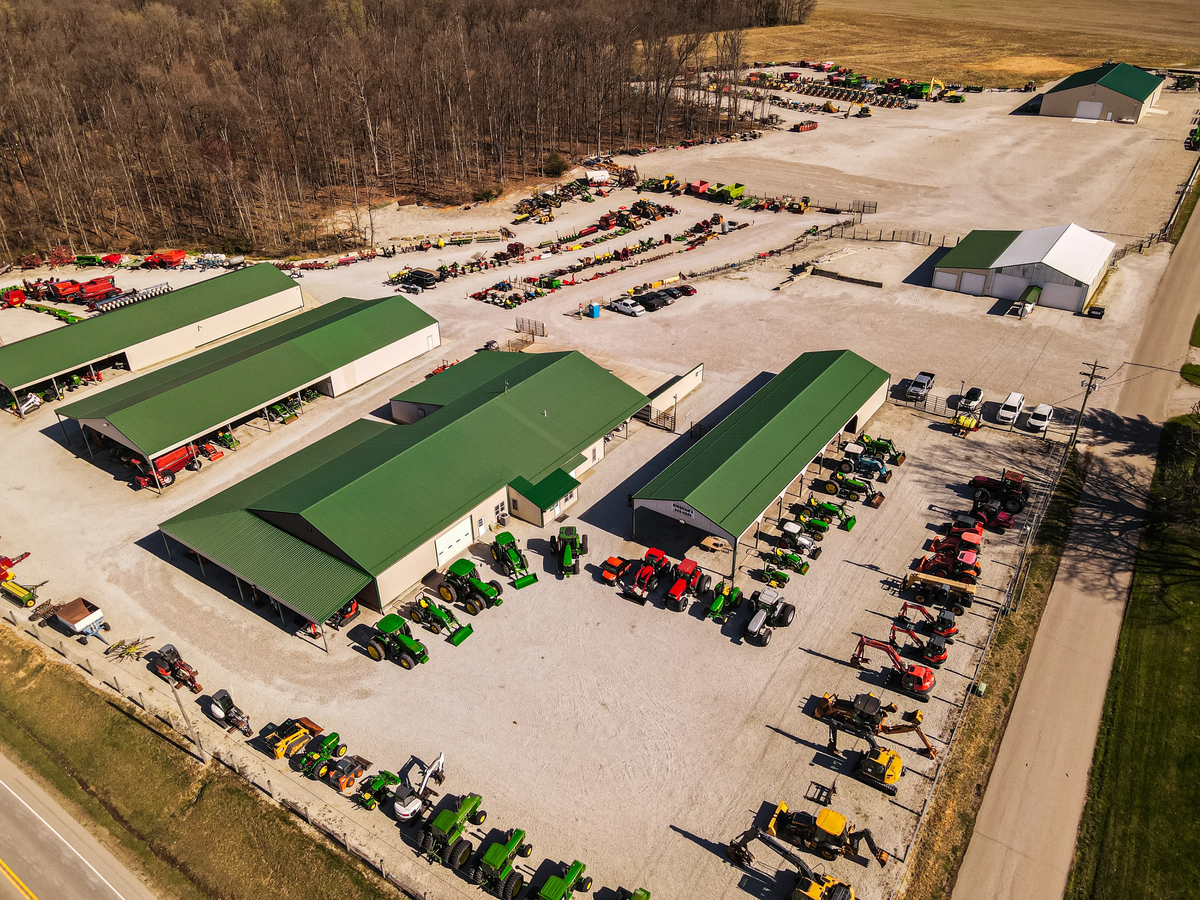 Tractors working in field